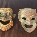 2 masques en bronze